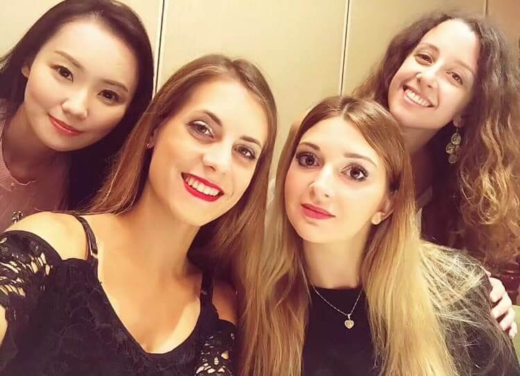 Selfie of four students at a Beijing duck restaurant in Beijing.